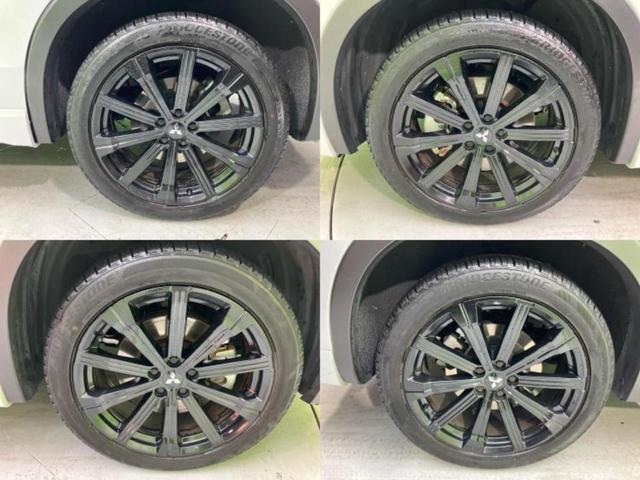 アウトランダーＰＨＥＶ ４ＷＤ　Ｐ　新品タイヤ／サンルーフ／ＢＯＳＥ／保証書／純正　ＳＤナビ／衝突安全装置／シートヒーター／全方位モニター／車線逸脱防止支援システム／シート　合皮／電動バックドア／ヘッドランプ　ＬＥＤ　全周囲カメラ（55枚目）