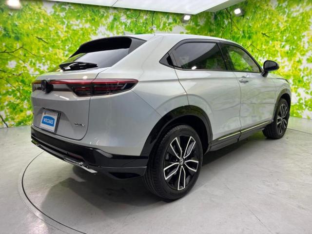 ヴェゼル ｅＨＥＶ　Ｚ　純正エアロ／保証書／純正　９インチ　ＳＤナビ／衝突安全装置／シートヒーター／マルチビューカメラシステム／車線逸脱防止支援システム／シート　ハーフレザー／電動バックドア／ヘッドランプ　ＬＥＤ　フルエアロ（3枚目）