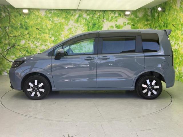 フリード 4WD eHEVエアーEX 新品タイヤ/エアロ/保証書/純正 9インチ SDナビ/ホンダセンシング/両側電動スライドドア/シートヒーター 前席/マルチビューカメラシステム/車線逸脱防止支援システム/シート ハーフレザー 4WD(2枚目)