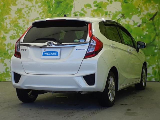 フィットハイブリッド ハイブリッド・Ｌパッケージ　新品タイヤ／社外　ナビ／パーキングアシスト　バックガイド／ヘッドランプ　ＨＩＤ／Ｂｌｕｅｔｏｏｔｈ接続／ＥＴＣ／ＥＢＤ付ＡＢＳ／横滑り防止装置／アイドリングストップ／ホンダセンシング　バックカメラ（3枚目）