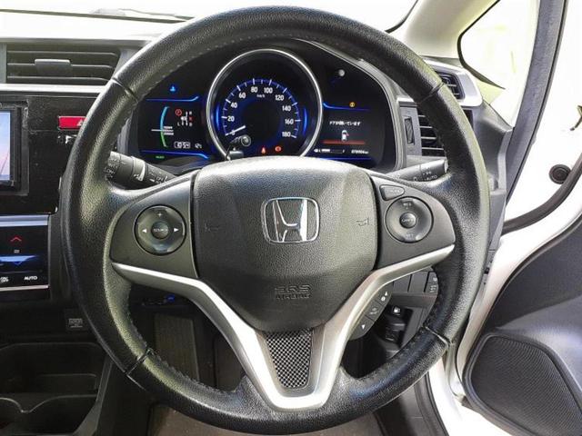 フィットハイブリッド ハイブリッド・Ｌパッケージ　新品タイヤ／社外　ナビ／パーキングアシスト　バックガイド／ヘッドランプ　ＨＩＤ／Ｂｌｕｅｔｏｏｔｈ接続／ＥＴＣ／ＥＢＤ付ＡＢＳ／横滑り防止装置／アイドリングストップ／ホンダセンシング　バックカメラ（15枚目）