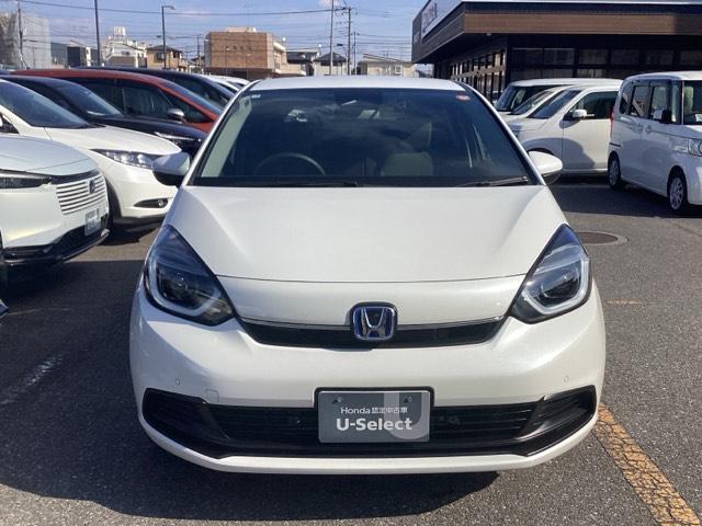 フィット ｅ：ＨＥＶホーム　ホンダセンシング　ホンダコネクトナビ＆Ｒカメラ　ドラレコ　サイドエアバック　ＥＴＣ　フルオートエアコン　前後誤発進抑制機能　クリソナ　助手席エアバッグ　運転席エアバッグ　１オナ　アイドリングストップ（2枚目）