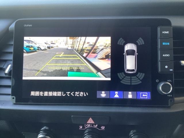 フィット ｅ：ＨＥＶホーム　ホンダセンシング　ホンダコネクトナビ＆Ｒカメラ　ドラレコ　サイドエアバック　ＥＴＣ　フルオートエアコン　前後誤発進抑制機能　クリソナ　助手席エアバッグ　運転席エアバッグ　１オナ　アイドリングストップ（6枚目）