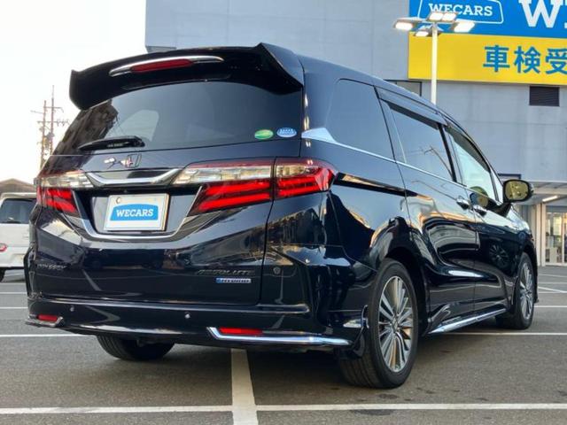 オデッセイハイブリッド ハイブリッドアブソルート・EXホンダセンシング 新品タイヤ/純正 9インチ SDナビ/フリップダウンモニター 純正 11インチ/ホンダセンシング/両側電動スライドドア/シートヒーター 前席/マルチビューカメラシステム/シート ハーフレザー 記録簿(3枚目)