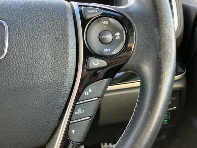 オデッセイハイブリッド ハイブリッドアブソルート・EXホンダセンシング 新品タイヤ/純正 9インチ SDナビ/フリップダウンモニター 純正 11インチ/ホンダセンシング/両側電動スライドドア/シートヒーター 前席/マルチビューカメラシステム/シート ハーフレザー 記録簿(30枚目)