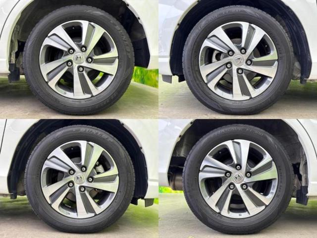 フリード Ｇホンダセンシング　新品タイヤ／保証書／純正　ＳＤナビ／ホンダセンシング／両側電動スライドドア／シートヒーター　前席／車線逸脱防止支援システム／シート　ハーフレザー／ドライブレコーダー　前後／ヘッドランプ　ＬＥＤ　禁煙車（63枚目）