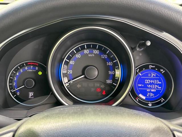 フィット １３Ｇ・Ｆパッケージ　保証書／純正　ＳＤナビ／Ｂｌｕｅｔｏｏｔｈ接続／ＥＢＤ付ＡＢＳ／横滑り防止装置／アイドリングストップ／ワンセグＴＶ／ＤＶＤ／エアバッグ　運転席／エアバッグ　助手席／衝突安全ボディ／パワーウインドウ（12枚目）