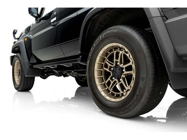 ランドクルーザー７０ ＡＸ　モデリスタ１８インチＡＷ　ＪＡＯＳフロントバンパーガーニッシュ／Ｆ＆Ｒアンダーカバー　カーセキュリティ（Ｇｒｇｏ－ＺＶＩＩ）　ベーシックナビ（ＮＭＺＫ－Ｗ７３Ｄ）　サイドバイザー　フロアマット（14枚目）