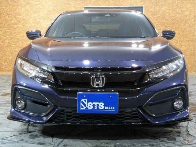 シビック ハッチバック　６速ＭＴ　センターデュアルマフラー　リアスポイラー　ホンダセンシング　ハーフレザー　シートヒーター　パワーシート　純正ナビ　フルセグＴＶ　バックモニター　ＬＥＤヘッドライト　純正ＡＷ　クルコン　ＥＴＣ（7枚目）