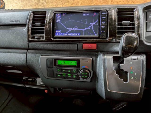レジアスエースバン スーパーＧＬ　ダークプライムＩＩ　ユーザー様直接仕入れ　４ＷＤ　ベッドキット　純正ナビ　デジタルＴＶ　Ｂｌｕｅｔｏｏｔｈ　ハーフレザーシート　ＬＥＤヘッドライト　フォグライト　ステアスイッチ　Ｐスタート　スマートキー　予備キー　ＥＴＣ（33枚目）