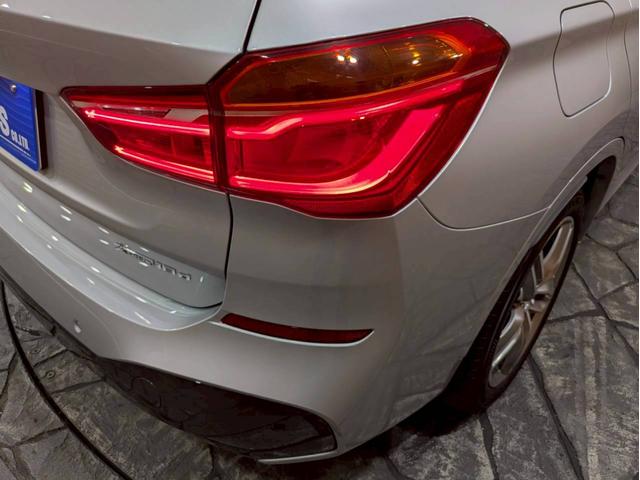 Ｘ１ ｘＤｒｉｖｅ　１８ｄ　Ｍスポーツ　ユーザー様直接仕入れ　アドバンスドセーフティ・ハイライン・コンフォートＰＫＧ　ルーフレール　レザーシート　メモリ付きパワーシート　純正ＡＷ　パワーバックドア　純正ナビ　ＨＵＤ　レーダークルーズ　ＥＴＣ（18枚目）