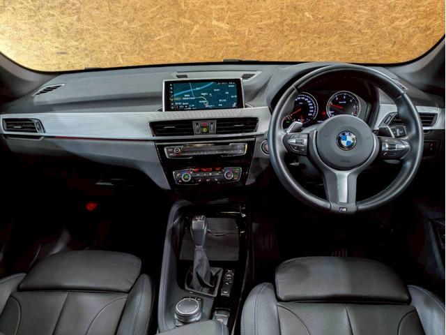 Ｘ１ ｘＤｒｉｖｅ　１８ｄ　Ｍスポーツ　ユーザー様直接仕入れ　アドバンスドセーフティ・ハイライン・コンフォートＰＫＧ　ルーフレール　レザーシート　メモリ付きパワーシート　純正ＡＷ　パワーバックドア　純正ナビ　ＨＵＤ　レーダークルーズ　ＥＴＣ（24枚目）
