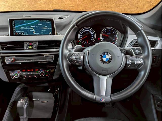Ｘ１ ｘＤｒｉｖｅ　１８ｄ　Ｍスポーツ　ユーザー様直接仕入れ　アドバンスドセーフティ・ハイライン・コンフォートＰＫＧ　ルーフレール　レザーシート　メモリ付きパワーシート　純正ＡＷ　パワーバックドア　純正ナビ　ＨＵＤ　レーダークルーズ　ＥＴＣ（27枚目）