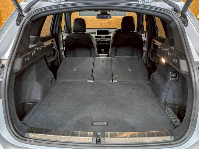 Ｘ１ ｘＤｒｉｖｅ　１８ｄ　Ｍスポーツ　ユーザー様直接仕入れ　アドバンスドセーフティ・ハイライン・コンフォートＰＫＧ　ルーフレール　レザーシート　メモリ付きパワーシート　純正ＡＷ　パワーバックドア　純正ナビ　ＨＵＤ　レーダークルーズ　ＥＴＣ（70枚目）