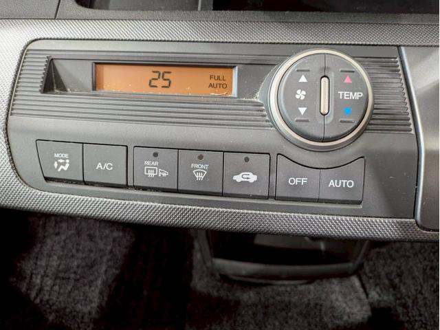 フリード Ｇ　ジャストセレクション　ユーザー様直接仕入れ　７人乗り　社外１５インチＡＷ　ＨＩＤヘッドライト　パワスラ　純正ナビ　デジタルＴＶ　バックモニター　シートバックフック・ポケット　ステアスイッチ　リモコンキー　スペアキー　ＥＴＣ（35枚目）