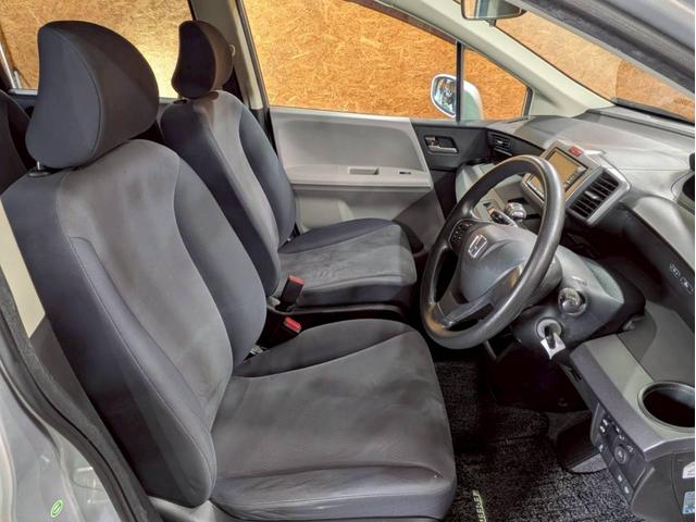 フリード Ｇ　ジャストセレクション　ユーザー様直接仕入れ　７人乗り　社外１５インチＡＷ　ＨＩＤヘッドライト　パワスラ　純正ナビ　デジタルＴＶ　バックモニター　シートバックフック・ポケット　ステアスイッチ　リモコンキー　スペアキー　ＥＴＣ（46枚目）