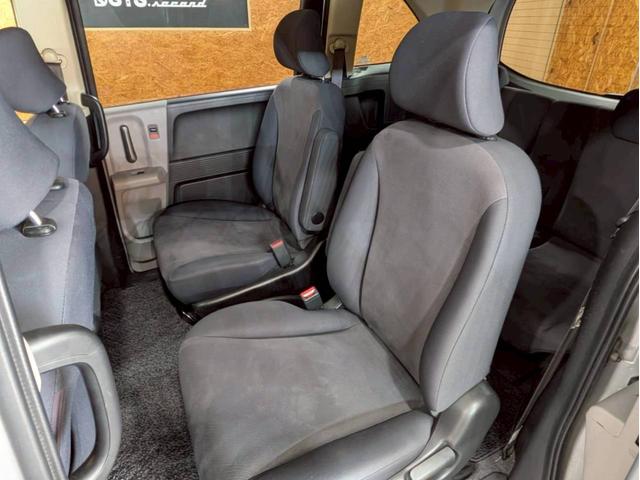 フリード Ｇ　ジャストセレクション　ユーザー様直接仕入れ　７人乗り　社外１５インチＡＷ　ＨＩＤヘッドライト　パワスラ　純正ナビ　デジタルＴＶ　バックモニター　シートバックフック・ポケット　ステアスイッチ　リモコンキー　スペアキー　ＥＴＣ（57枚目）