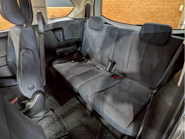 フリード Ｇ　ジャストセレクション　ユーザー様直接仕入れ　７人乗り　社外１５インチＡＷ　ＨＩＤヘッドライト　パワスラ　純正ナビ　デジタルＴＶ　バックモニター　シートバックフック・ポケット　ステアスイッチ　リモコンキー　スペアキー　ＥＴＣ（59枚目）