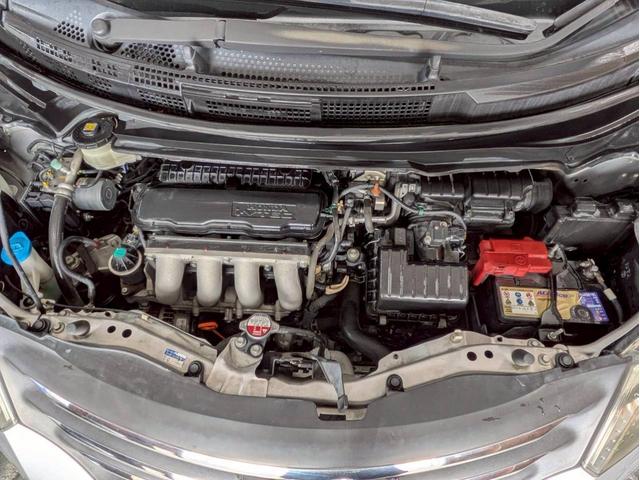 フリード Ｇ　ジャストセレクション　ユーザー様直接仕入れ　７人乗り　社外１５インチＡＷ　ＨＩＤヘッドライト　パワスラ　純正ナビ　デジタルＴＶ　バックモニター　シートバックフック・ポケット　ステアスイッチ　リモコンキー　スペアキー　ＥＴＣ（60枚目）