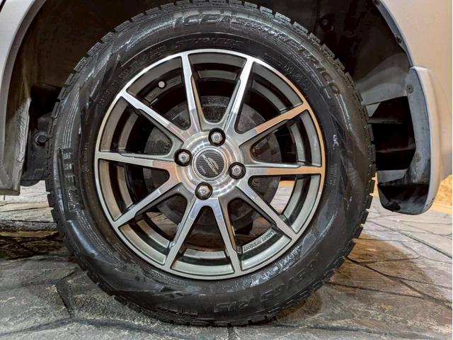 フリード Ｇ　ジャストセレクション　ユーザー様直接仕入れ　７人乗り　社外１５インチＡＷ　ＨＩＤヘッドライト　パワスラ　純正ナビ　デジタルＴＶ　バックモニター　シートバックフック・ポケット　ステアスイッチ　リモコンキー　スペアキー　ＥＴＣ（63枚目）