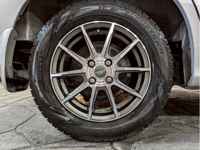 フリード Ｇ　ジャストセレクション　ユーザー様直接仕入れ　７人乗り　社外１５インチＡＷ　ＨＩＤヘッドライト　パワスラ　純正ナビ　デジタルＴＶ　バックモニター　シートバックフック・ポケット　ステアスイッチ　リモコンキー　スペアキー　ＥＴＣ（64枚目）