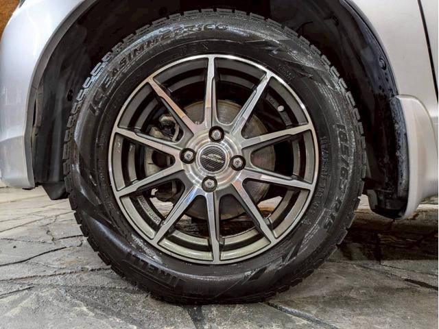 フリード Ｇ　ジャストセレクション　ユーザー様直接仕入れ　７人乗り　社外１５インチＡＷ　ＨＩＤヘッドライト　パワスラ　純正ナビ　デジタルＴＶ　バックモニター　シートバックフック・ポケット　ステアスイッチ　リモコンキー　スペアキー　ＥＴＣ（65枚目）