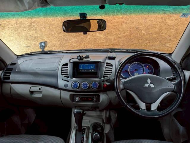 トライトン ベースグレード キャノピー ワンオーナー Stradaナビ Clarionオーディオ フォグランプ 純正AW パートタイム4WD ドアバイザー サイドステップ リモコンキー スペアキー ETC車載器 走行9.3万キロ(22枚目)