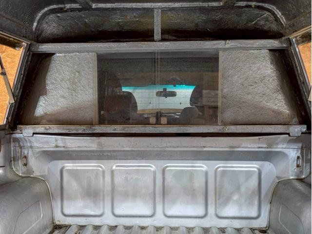 トライトン ベースグレード キャノピー ワンオーナー Stradaナビ Clarionオーディオ フォグランプ 純正AW パートタイム4WD ドアバイザー サイドステップ リモコンキー スペアキー ETC車載器 走行9.3万キロ(65枚目)