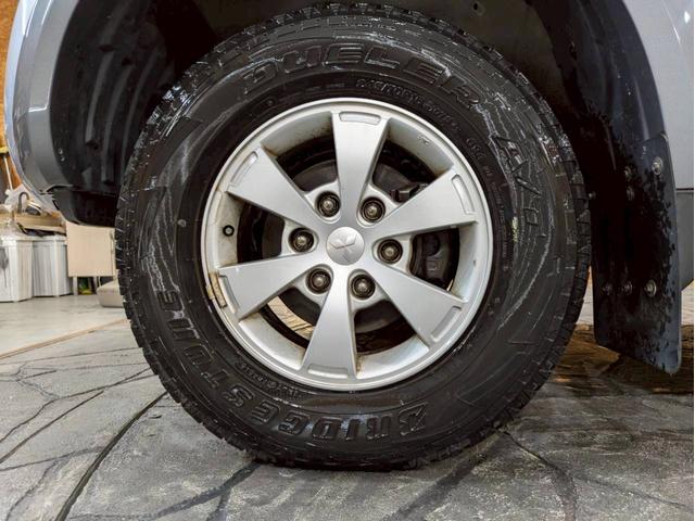 トライトン ベースグレード キャノピー ワンオーナー Stradaナビ Clarionオーディオ フォグランプ 純正AW パートタイム4WD ドアバイザー サイドステップ リモコンキー スペアキー ETC車載器 走行9.3万キロ(68枚目)