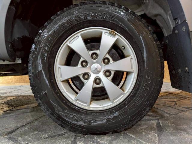 トライトン ベースグレード キャノピー ワンオーナー Stradaナビ Clarionオーディオ フォグランプ 純正AW パートタイム4WD ドアバイザー サイドステップ リモコンキー スペアキー ETC車載器 走行9.3万キロ(69枚目)