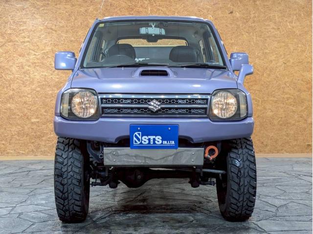 ジムニー ＸＧ　ユーザー様仕入　５ＭＴ　リフトアップ　タニグチマフラー　社外ステップ　ラテラルロッド　社外１６インチＡＷ　デジタルインナーミラー　社外ナビ　フルセグＴＶ　シートカバー　牽引フック　リモコンキー　ＥＴＣ（8枚目）