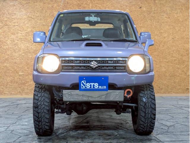 ジムニー ＸＧ　ユーザー様仕入　５ＭＴ　リフトアップ　タニグチマフラー　社外ステップ　ラテラルロッド　社外１６インチＡＷ　デジタルインナーミラー　社外ナビ　フルセグＴＶ　シートカバー　牽引フック　リモコンキー　ＥＴＣ（9枚目）