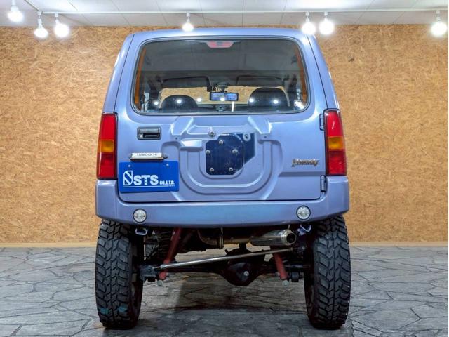 ジムニー ＸＧ　ユーザー様仕入　５ＭＴ　リフトアップ　タニグチマフラー　社外ステップ　ラテラルロッド　社外１６インチＡＷ　デジタルインナーミラー　社外ナビ　フルセグＴＶ　シートカバー　牽引フック　リモコンキー　ＥＴＣ（15枚目）