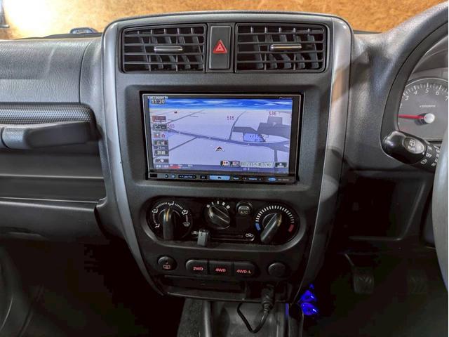 ジムニー ＸＧ　ユーザー様仕入　５ＭＴ　リフトアップ　タニグチマフラー　社外ステップ　ラテラルロッド　社外１６インチＡＷ　デジタルインナーミラー　社外ナビ　フルセグＴＶ　シートカバー　牽引フック　リモコンキー　ＥＴＣ（40枚目）