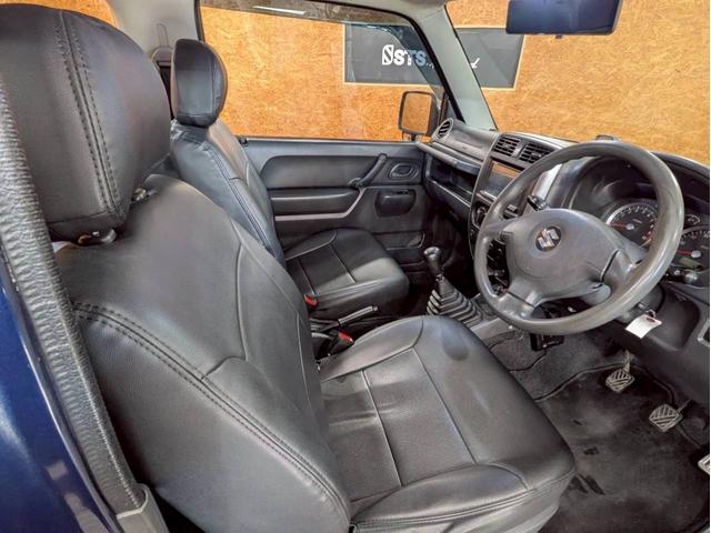 ジムニー ＸＧ　ユーザー様仕入　５ＭＴ　リフトアップ　タニグチマフラー　社外ステップ　ラテラルロッド　社外１６インチＡＷ　デジタルインナーミラー　社外ナビ　フルセグＴＶ　シートカバー　牽引フック　リモコンキー　ＥＴＣ（49枚目）