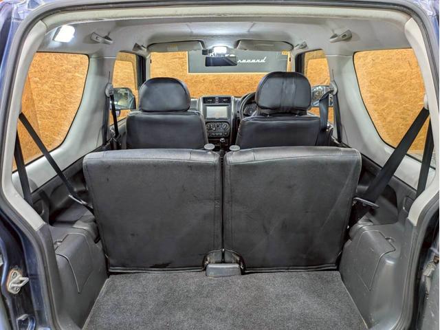 ジムニー ＸＧ　ユーザー様仕入　５ＭＴ　リフトアップ　タニグチマフラー　社外ステップ　ラテラルロッド　社外１６インチＡＷ　デジタルインナーミラー　社外ナビ　フルセグＴＶ　シートカバー　牽引フック　リモコンキー　ＥＴＣ（58枚目）