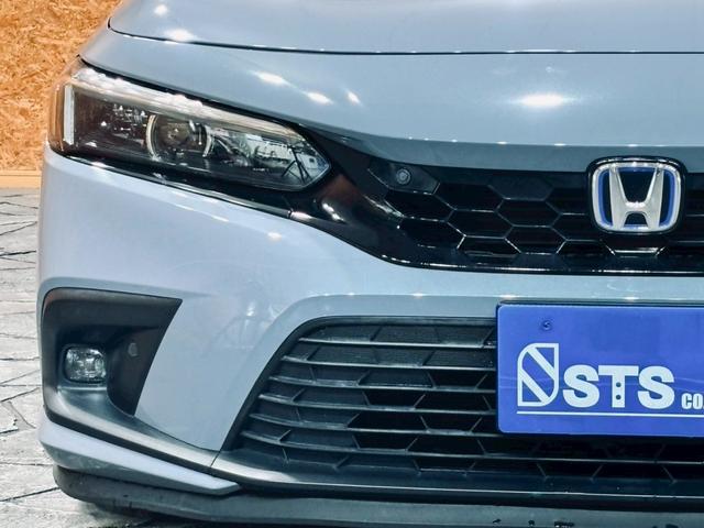 シビック e:HEV リアウィング ダウンサス LEDヘッドライト 純正18インチアルミ 純正ナビ フルセグTV BT接続 バックカメラ ハーフレザー パワーシート シートヒーター クルコン 置くだけ充電 ドラレコ ETC(10枚目)