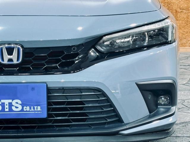 シビック e:HEV リアウィング ダウンサス LEDヘッドライト 純正18インチアルミ 純正ナビ フルセグTV BT接続 バックカメラ ハーフレザー パワーシート シートヒーター クルコン 置くだけ充電 ドラレコ ETC(11枚目)
