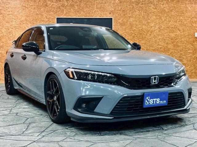 シビック e:HEV リアウィング ダウンサス LEDヘッドライト 純正18インチアルミ 純正ナビ フルセグTV BT接続 バックカメラ ハーフレザー パワーシート シートヒーター クルコン 置くだけ充電 ドラレコ ETC(12枚目)