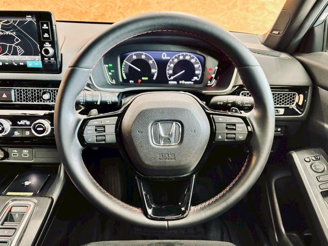 シビック e:HEV リアウィング ダウンサス LEDヘッドライト 純正18インチアルミ 純正ナビ フルセグTV BT接続 バックカメラ ハーフレザー パワーシート シートヒーター クルコン 置くだけ充電 ドラレコ ETC(25枚目)