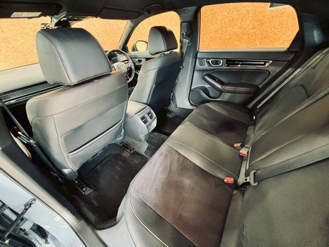 シビック e:HEV リアウィング ダウンサス LEDヘッドライト 純正18インチアルミ 純正ナビ フルセグTV BT接続 バックカメラ ハーフレザー パワーシート シートヒーター クルコン 置くだけ充電 ドラレコ ETC(56枚目)