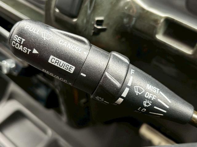 ビッグホーン ハンドリングバイロータス　ロング　ユーザー様直接仕入　サンルーフ　ガナドールマフラー　インチアップ　社外１６ＡＷ　Ａ／Ｔタイヤ　ルーフスポイラー　サイドステップ　社外ナビ　フルセグＴＶ　バックカメラ　シートヒーター　スペアキー　ＥＴＣ（27枚目）