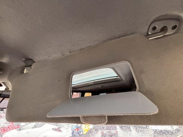 ビッグホーン ハンドリングバイロータス　ロング　ユーザー様直接仕入　サンルーフ　ガナドールマフラー　インチアップ　社外１６ＡＷ　Ａ／Ｔタイヤ　ルーフスポイラー　サイドステップ　社外ナビ　フルセグＴＶ　バックカメラ　シートヒーター　スペアキー　ＥＴＣ（29枚目）