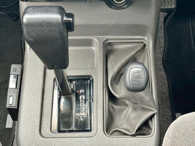 ビッグホーン ハンドリングバイロータス　ロング　ユーザー様直接仕入　サンルーフ　ガナドールマフラー　インチアップ　社外１６ＡＷ　Ａ／Ｔタイヤ　ルーフスポイラー　サイドステップ　社外ナビ　フルセグＴＶ　バックカメラ　シートヒーター　スペアキー　ＥＴＣ（40枚目）