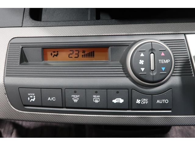 フリードハイブリッド ジャストセレクション 1年保証付 Bカメラ ナビ ETC 両側スライド片側電動ドア セキュリティー 横滑り防止機能 オートクルーズ 地デジ エアバック ウォークスルー DVD再生可能 キーレスエントリー PS 3列 ABS(12枚目)