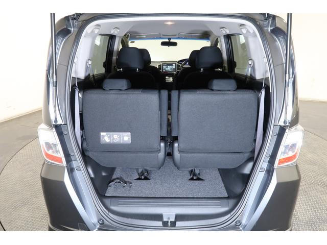 フリードハイブリッド ジャストセレクション 1年保証付 Bカメラ ナビ ETC 両側スライド片側電動ドア セキュリティー 横滑り防止機能 オートクルーズ 地デジ エアバック ウォークスルー DVD再生可能 キーレスエントリー PS 3列 ABS(21枚目)