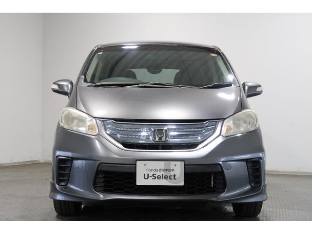 フリードハイブリッド ジャストセレクション 1年保証付 Bカメラ ナビ ETC 両側スライド片側電動ドア セキュリティー 横滑り防止機能 オートクルーズ 地デジ エアバック ウォークスルー DVD再生可能 キーレスエントリー PS 3列 ABS(24枚目)