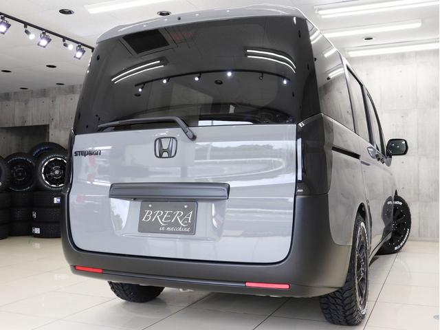 ステップワゴン G Eセレクション ブレラOGカスタム 新品社外AW&新品マッドテレーンタイヤ インナーブラックヘッドライト テールランプブラックアウト マットブラック塗り分け 両側電動スライドドア HDDナビ ETC スマートキー(9枚目)