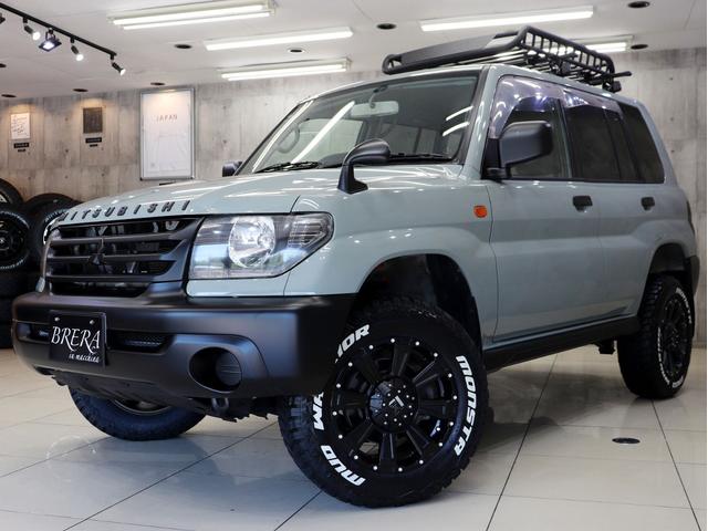 パジェロイオ ZX 4WD BRERAオリジナルカスタム 新品社外アルミホイール 新品マッドテレーンタイヤ 新品ルーフラック&新品ベースキャリア インナーブラックヘッドライト テールランプブラックアウト ETC キーレス(3枚目)