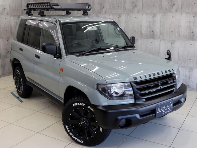 パジェロイオ ZX 4WD BRERAオリジナルカスタム 新品社外アルミホイール 新品マッドテレーンタイヤ 新品ルーフラック&新品ベースキャリア インナーブラックヘッドライト テールランプブラックアウト ETC キーレス(4枚目)